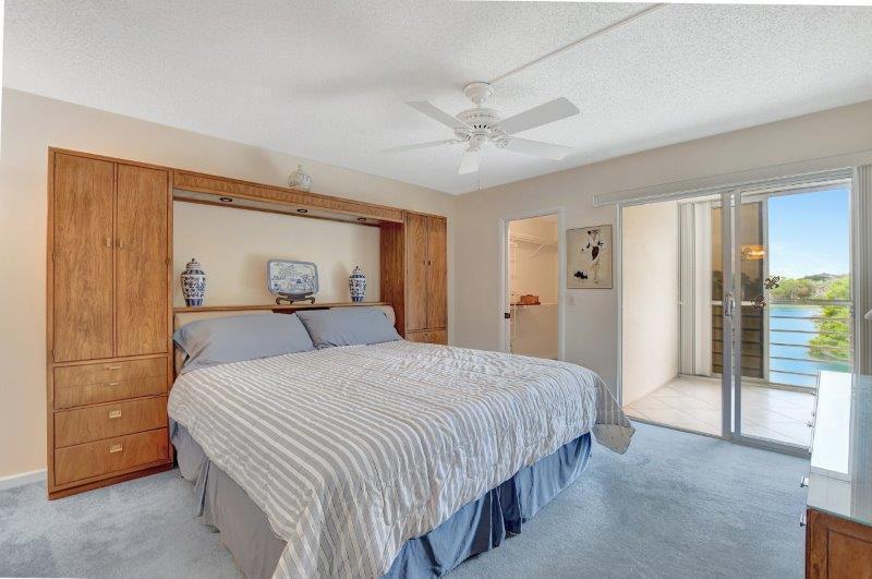3034 Ainslie C Boca Raton, FL 33434 - Photo 8 of 42 3034 AINSLIE C MASTER BEDROOM VIEW 1 LAK