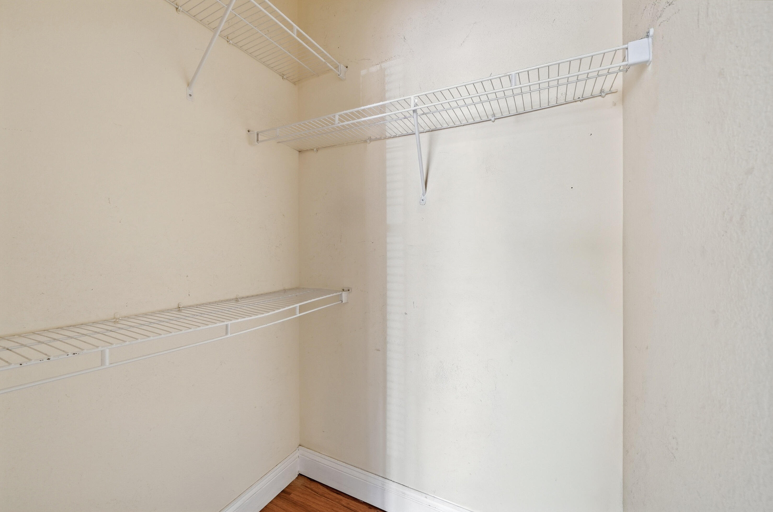 1584 Southwest 2nd Street Homestead, FL 33030 - Photo 21 of 28 a view of an empty walk in closet