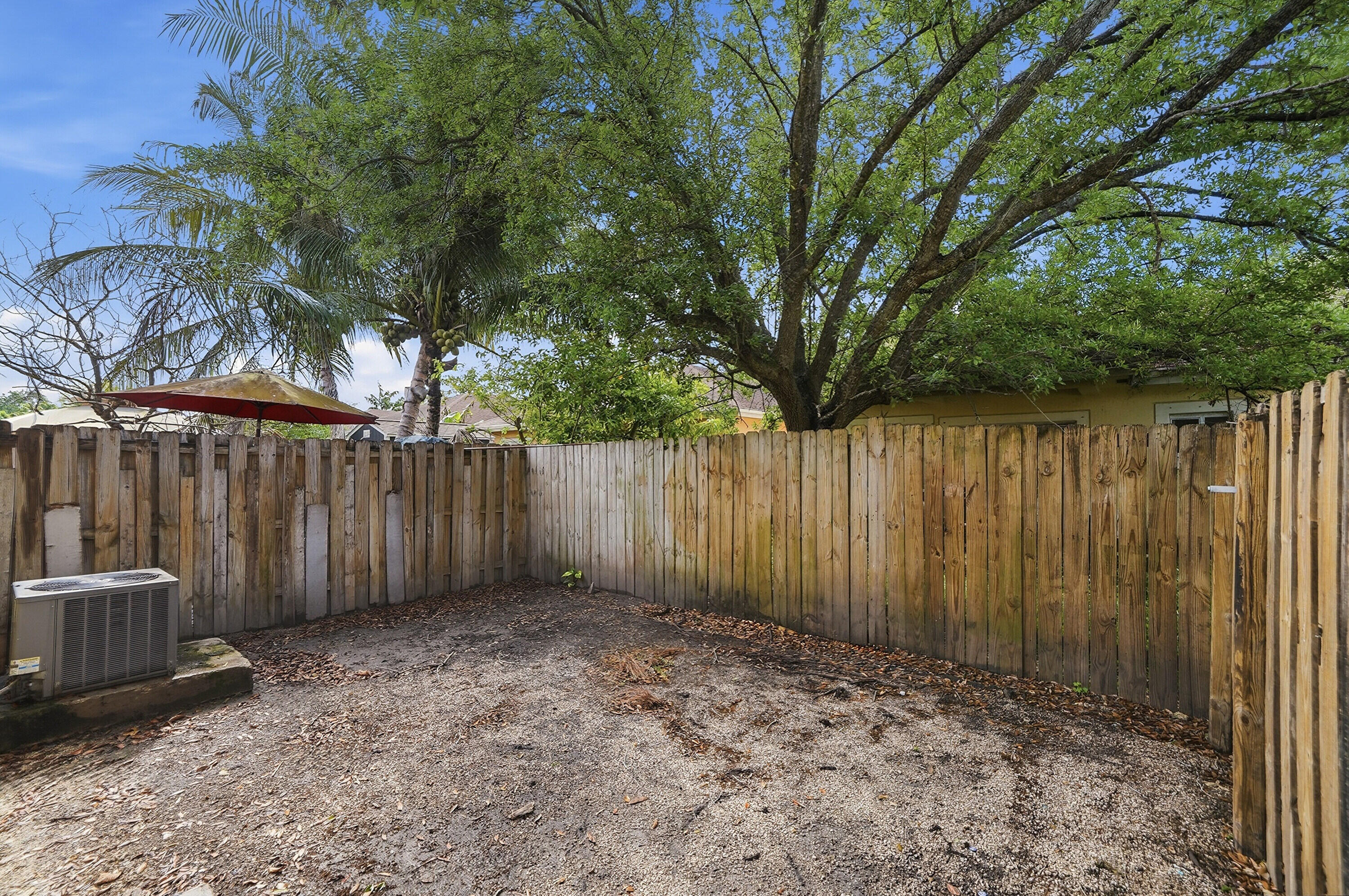 1584 Southwest 2nd Street Homestead, FL 33030 - Photo 23 of 28 a view of backyard with tree