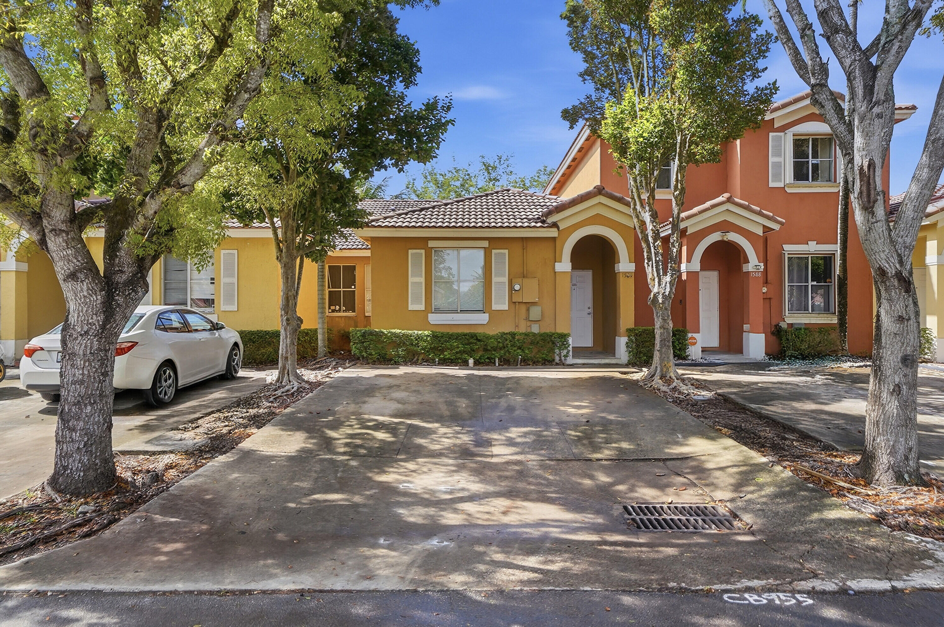 1584 Southwest 2nd Street Homestead, FL 33030 - Photo 28 of 28 a front view of a house with a yard