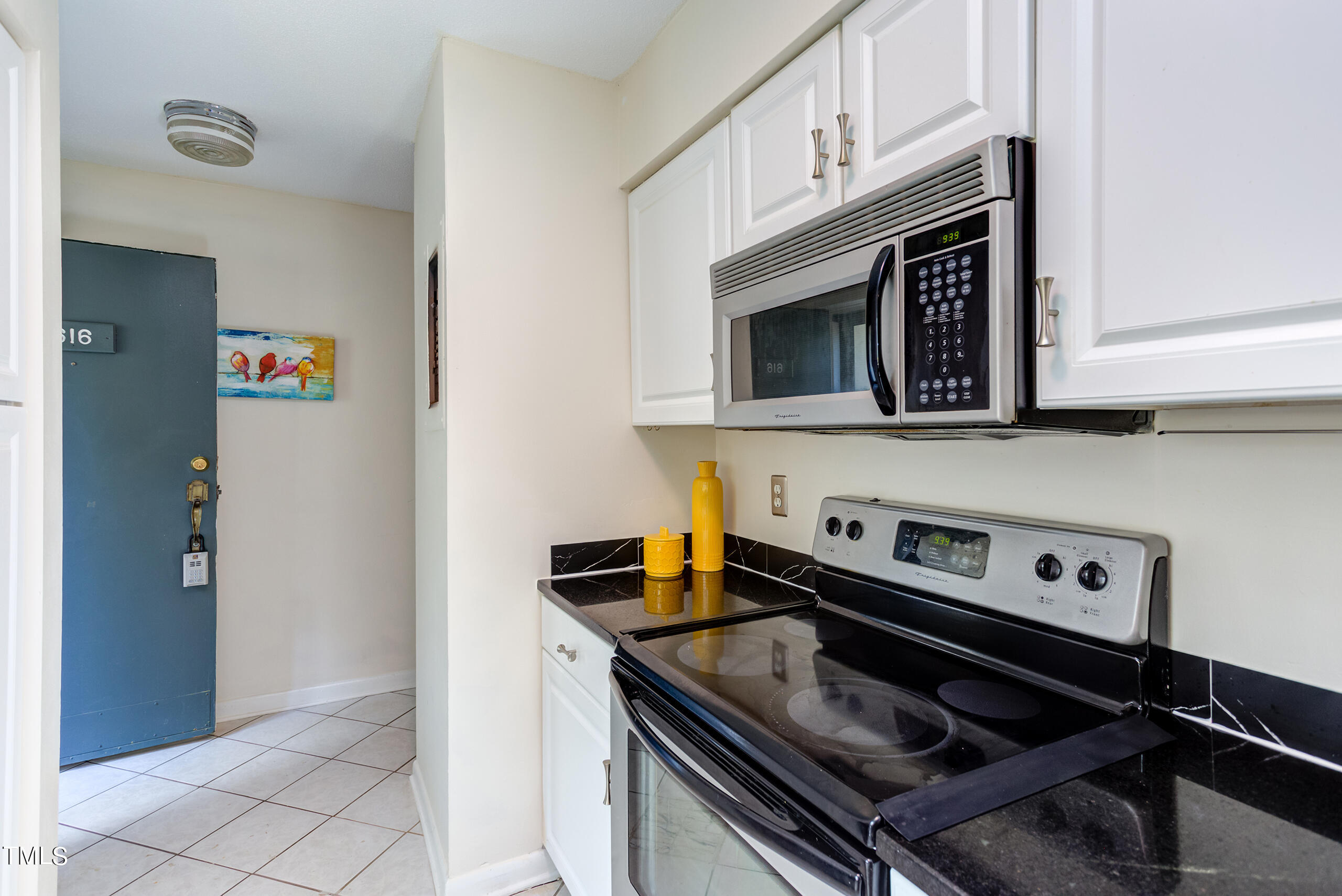 616 Pine Ridge Place Raleigh, NC 27609 - Photo 4 of 32 Entry from Kitchen 2