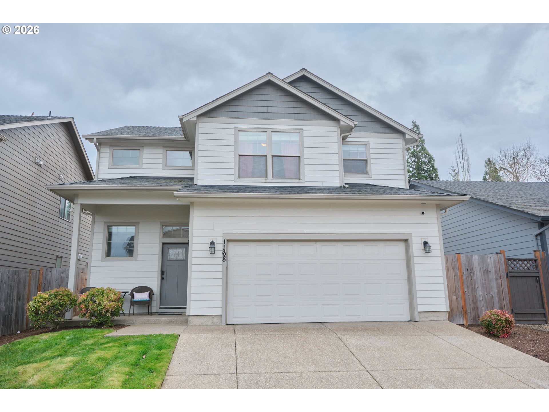 1168 Taurus Loop Northeast Keizer, OR 97303 - Photo 1 of 30 a view of a yard in front of a house