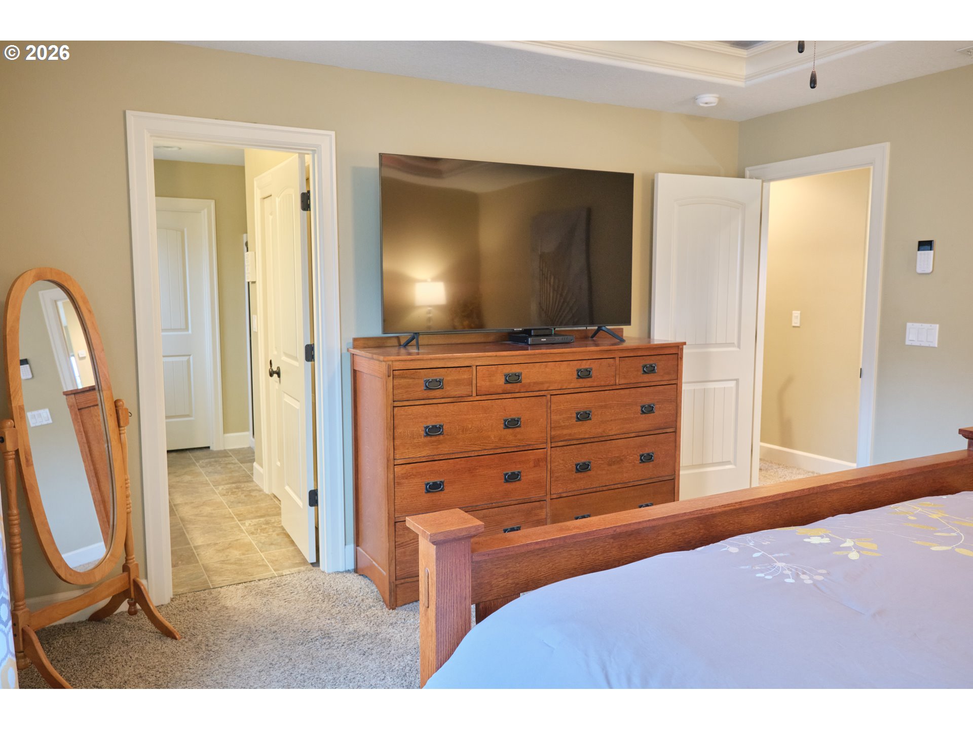 1168 Taurus Loop Northeast Keizer, OR 97303 - Photo 14 of 30 a living room with furniture a flat screen tv and a dresser