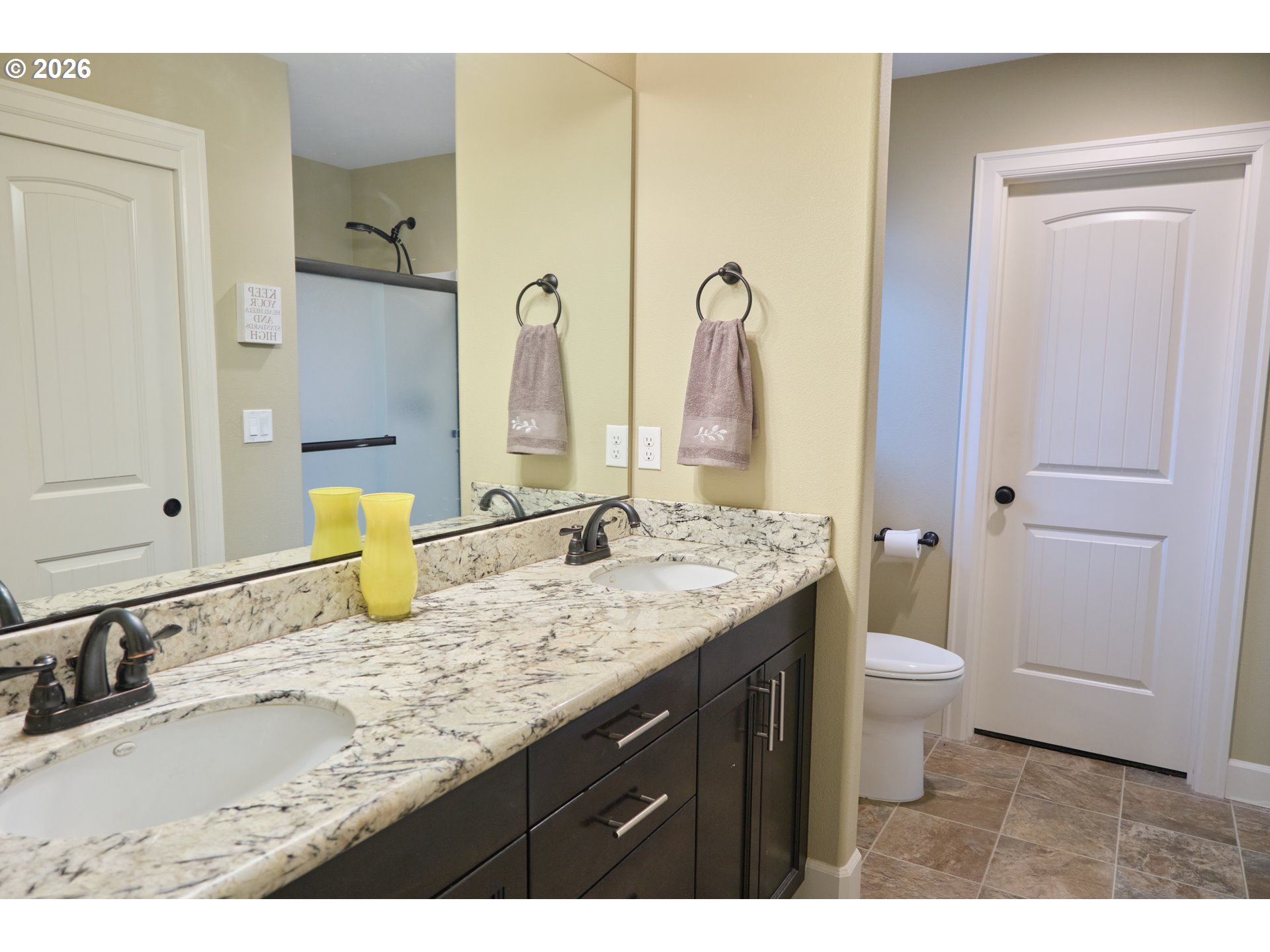 1168 Taurus Loop Northeast Keizer, OR 97303 - Photo 16 of 30 a bathroom with a granite countertop sink and a mirror