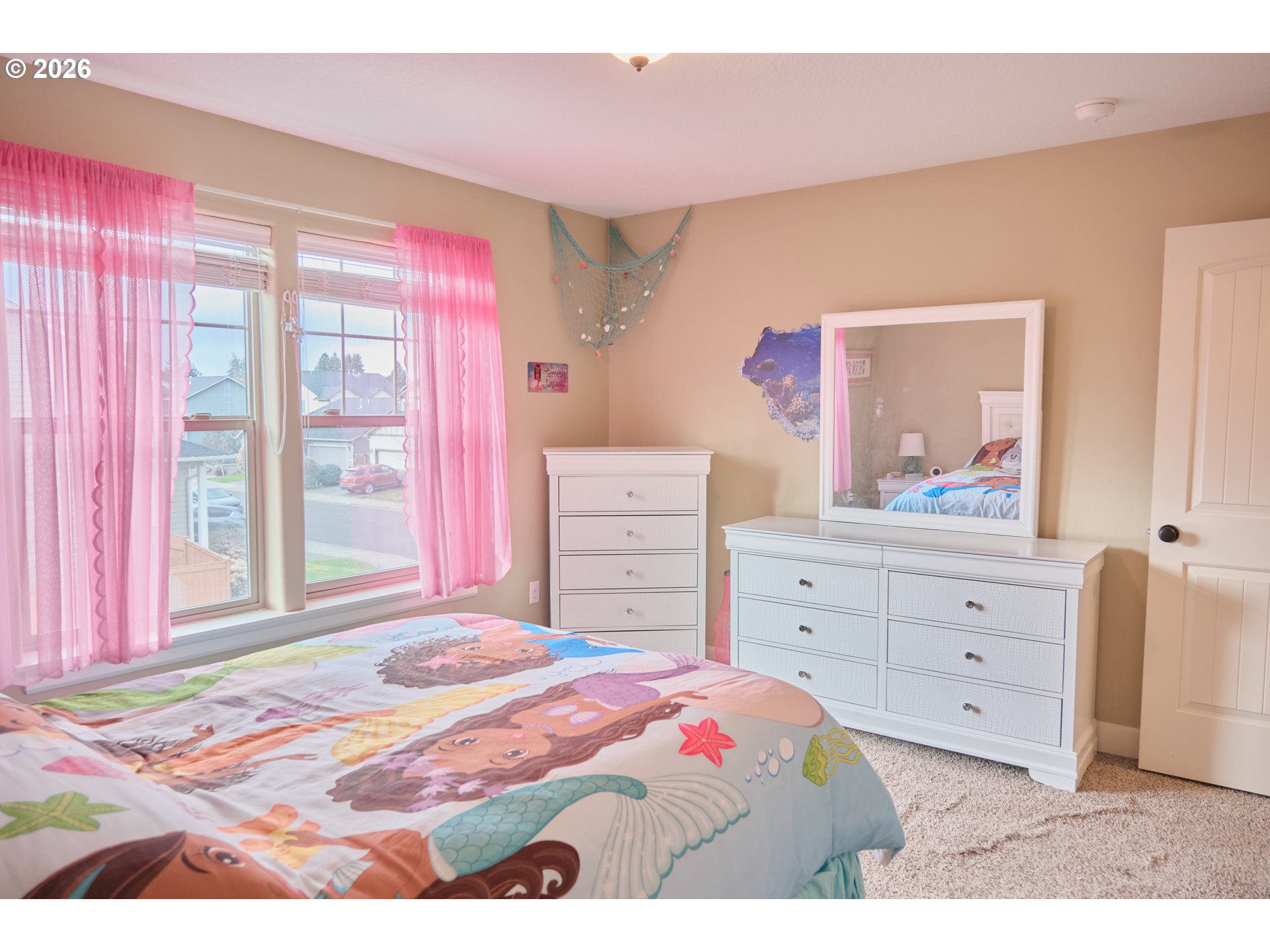 1168 Taurus Loop Northeast Keizer, OR 97303 - Photo 18 of 30 a bedroom with a bed and a dresser