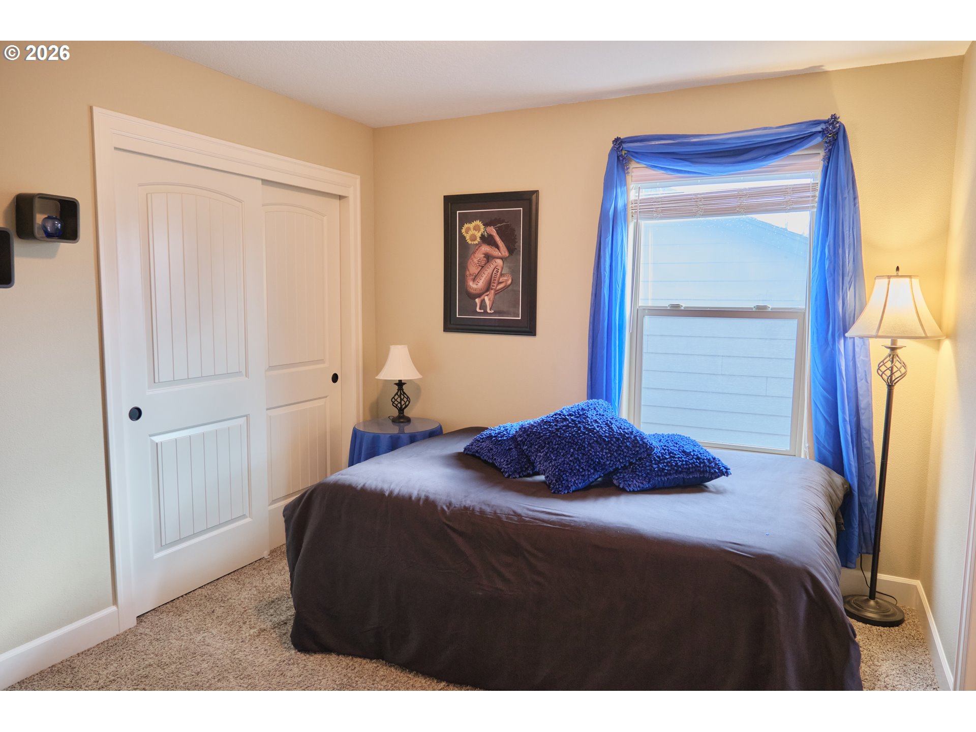 1168 Taurus Loop Northeast Keizer, OR 97303 - Photo 20 of 30 a bedroom with a bed and a window