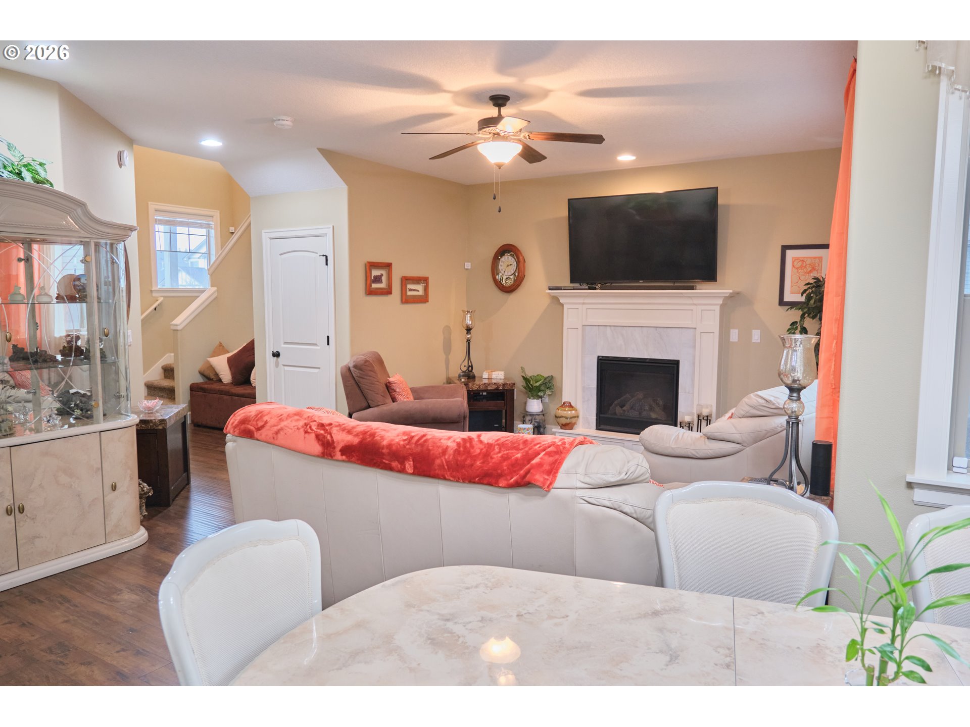 1168 Taurus Loop Northeast Keizer, OR 97303 - Photo 9 of 30 a living room with fireplace furniture and a flat screen tv