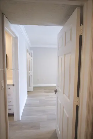 a view of room with window and stairs