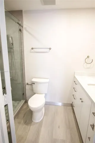 a bathroom with a toilet and a sink