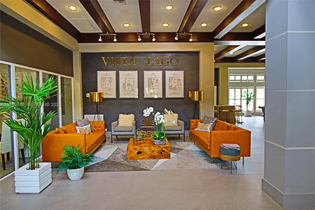 a very nice looking dining room with a large dining table and chairs