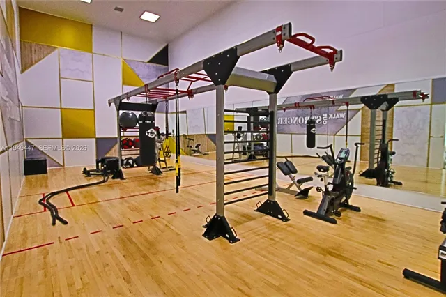 a view of a room with gym equipment