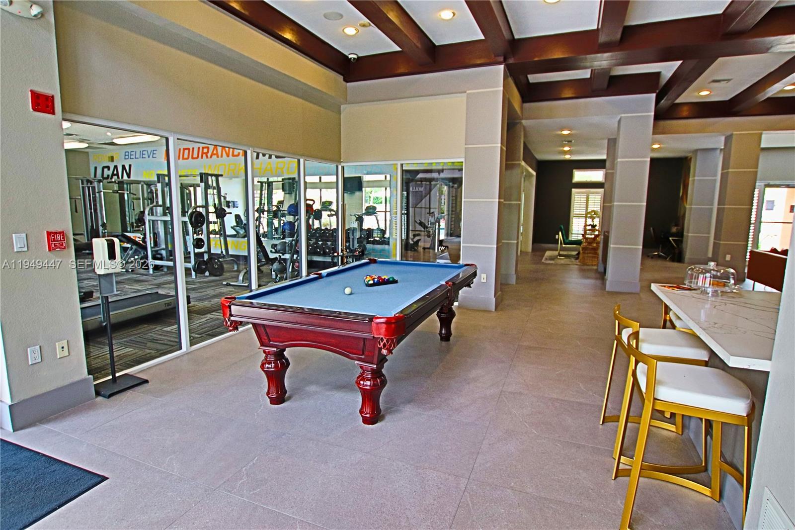 10681 Southwest 156th Place, Unit 402 Miami, FL 33196 - Photo 35 of 36 a room with pool table and windows
