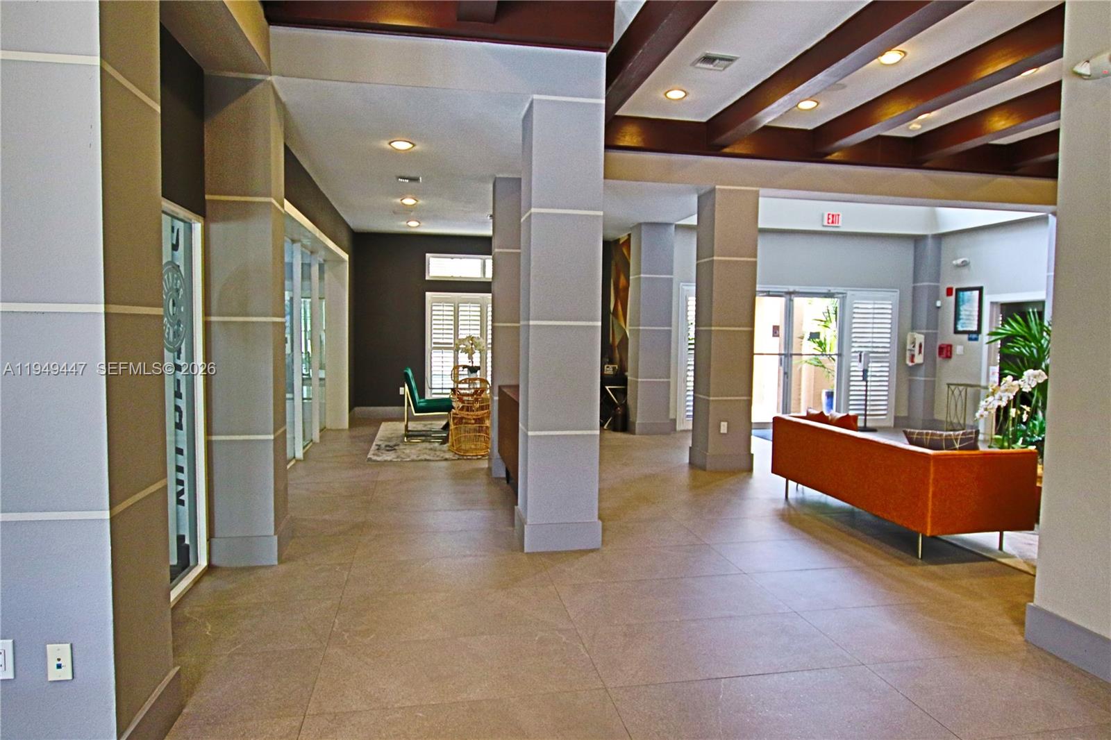 10681 Southwest 156th Place, Unit 402 Miami, FL 33196 - Photo 36 of 36 a view of a living room