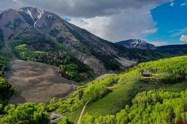 a view of a lake with a mountain in the background