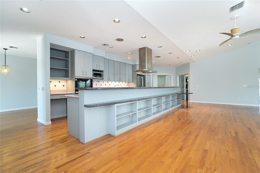 5 Pointe Way Placida, FL 33946 - Photo 14 of 69 a large kitchen with stainless steel appliances a large counter top and a wooden floors