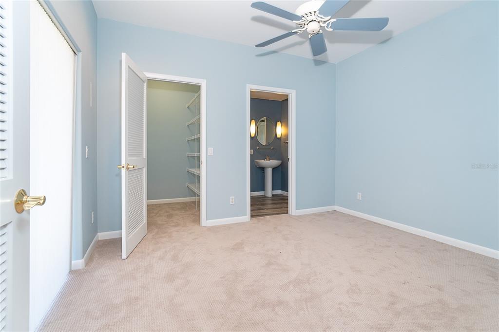 5 Pointe Way Placida, FL 33946 - Photo 26 of 69 an empty room with closet and a chandelier fan