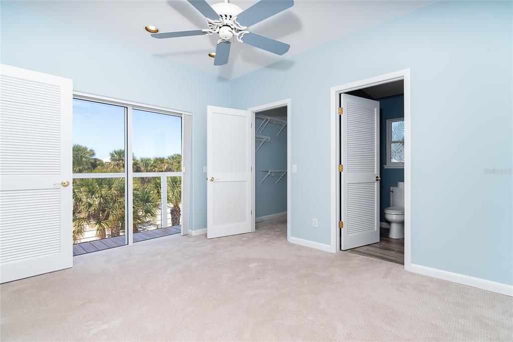 5 Pointe Way Placida, FL 33946 - Photo 28 of 69 an empty room with chandelier fan