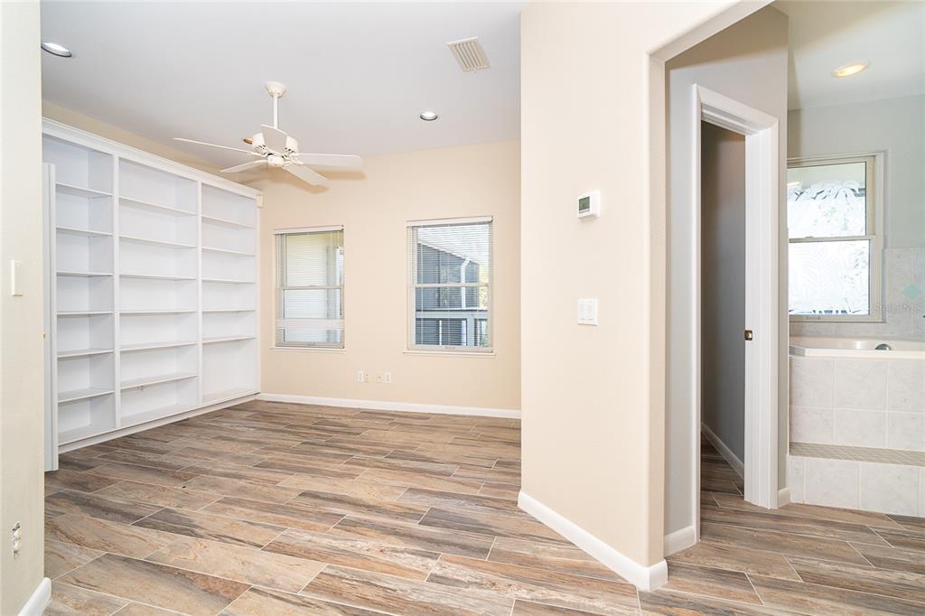 5 Pointe Way Placida, FL 33946 - Photo 34 of 69 an empty room with cabinet and windows