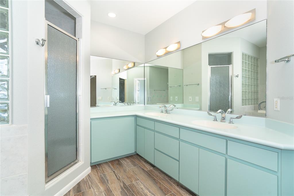5 Pointe Way Placida, FL 33946 - Photo 37 of 69 a bathroom with a double vanity sink mirror and double