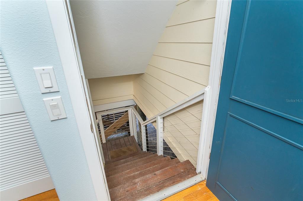 5 Pointe Way Placida, FL 33946 - Photo 39 of 69 a view of staircase with railing and white walls