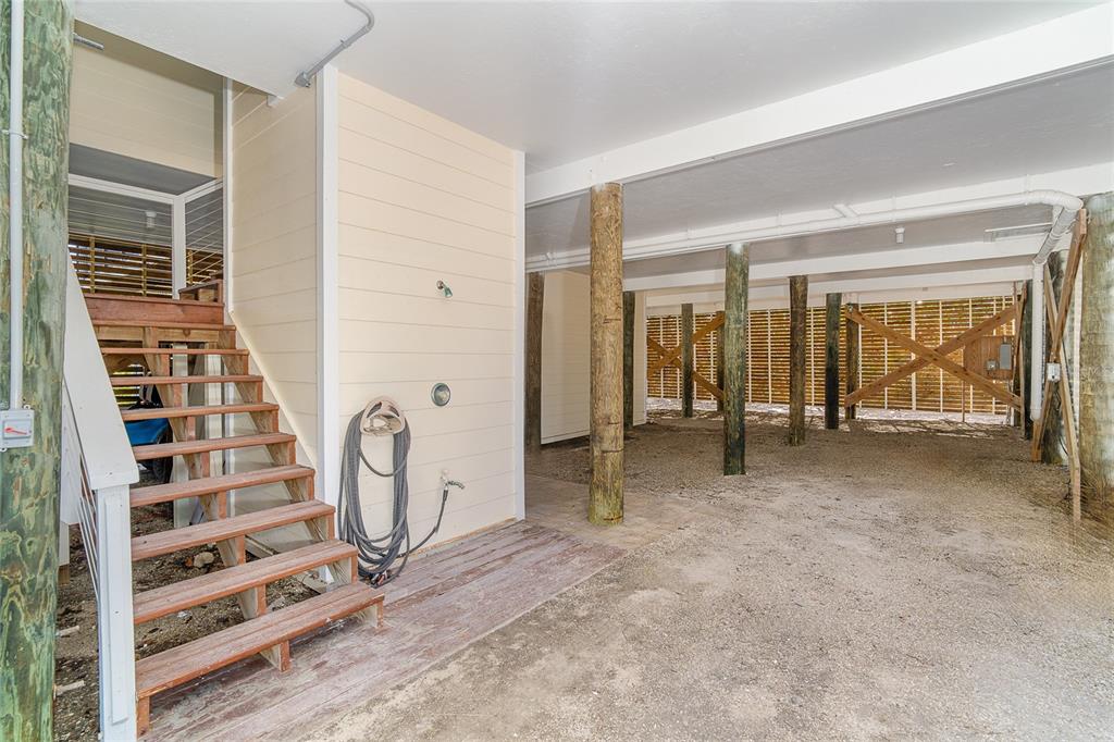 5 Pointe Way Placida, FL 33946 - Photo 40 of 69 a view of a livingroom with wooden floor and windows
