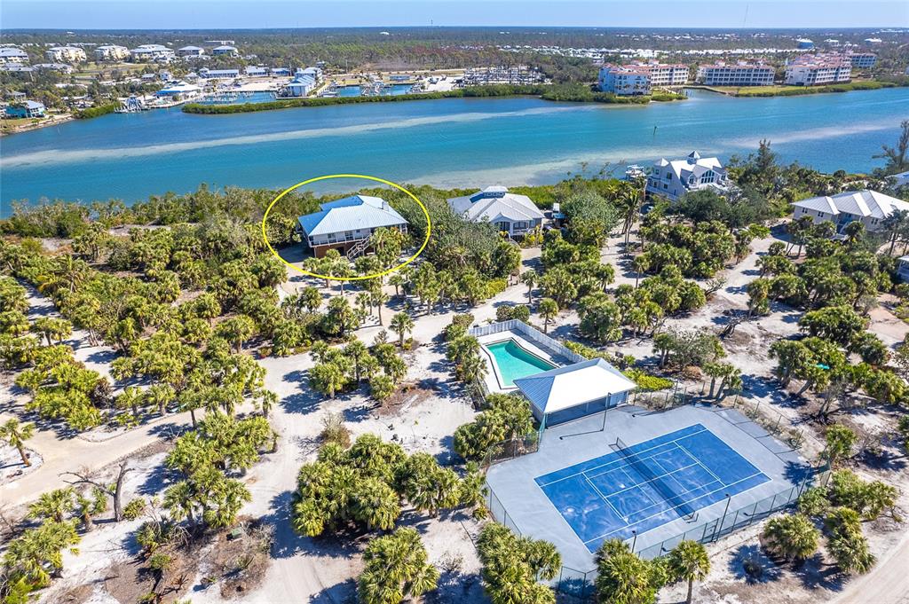 5 Pointe Way Placida, FL 33946 - Photo 43 of 69 an aerial view of a houses with a lake view