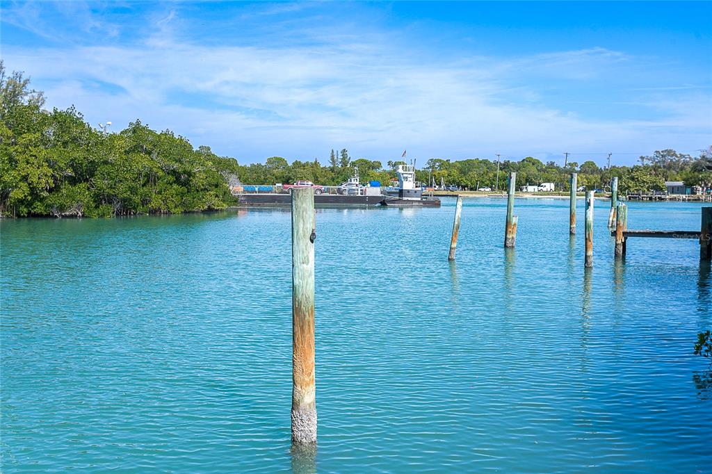 5 Pointe Way Placida, FL 33946 - Photo 58 of 69 a view of a lake with houses in the back