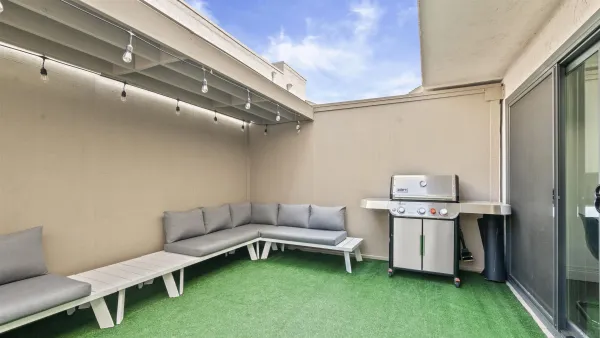 a living room with furniture and a table