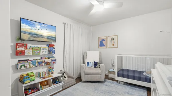 a bedroom with furniture and a couch