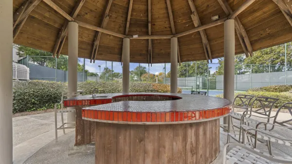 a view of outdoor space with swimming pool and furniture