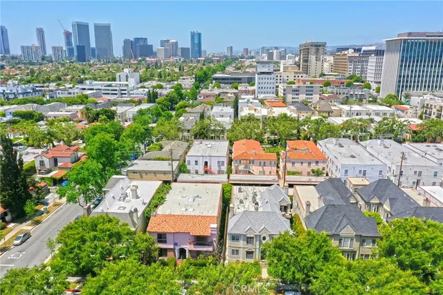 an aerial view of a city with lots of residential buildings