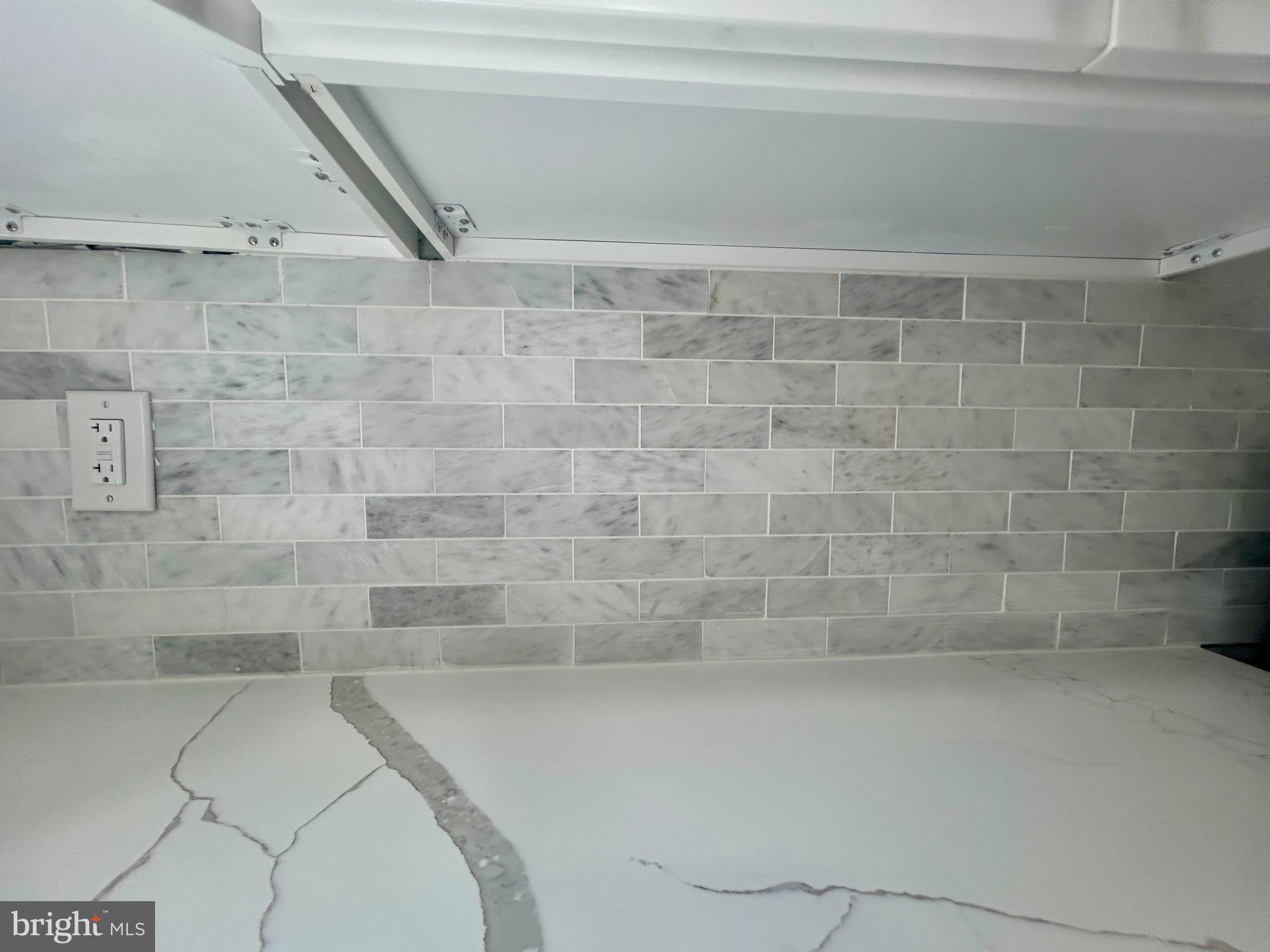 4303 Griscom Street Philadelphia, PA 19124 - Photo 15 of 43 Backsplash and Granite in Kitchen