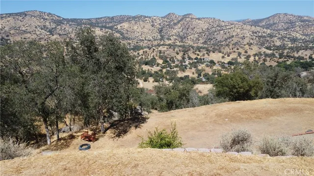 a view of a covered with snow in the yard