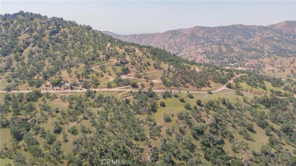 0 Totem Lane Squaw Valley, CA 93675 - Photo 3 of 33 a view of a mountain in the distance in a field