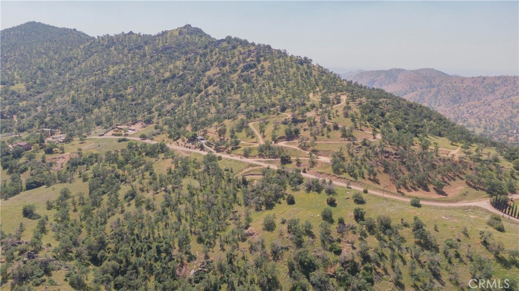 0 Totem Lane Squaw Valley, CA 93675 - Photo 33 of 33 a view of a dry yard with mountains in the background