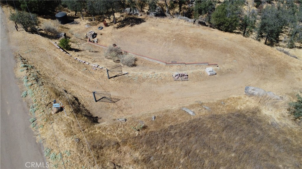 0 Totem Lane Squaw Valley, CA 93675 - Photo 7 of 33 a view of a dry yard with trees