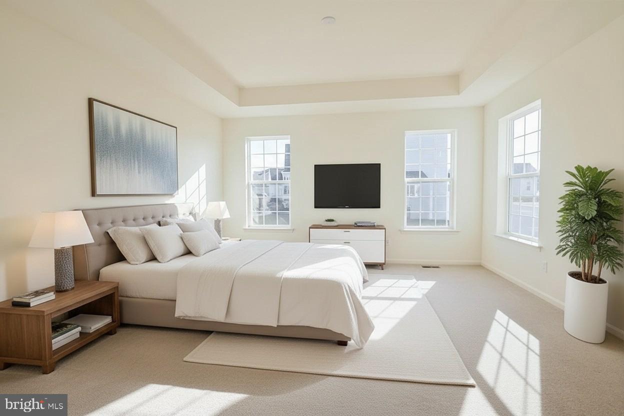 910 Weatherstone Lane Felton, DE 19943 - Photo 21 of 29 a bedroom with a bed and a flat screen tv