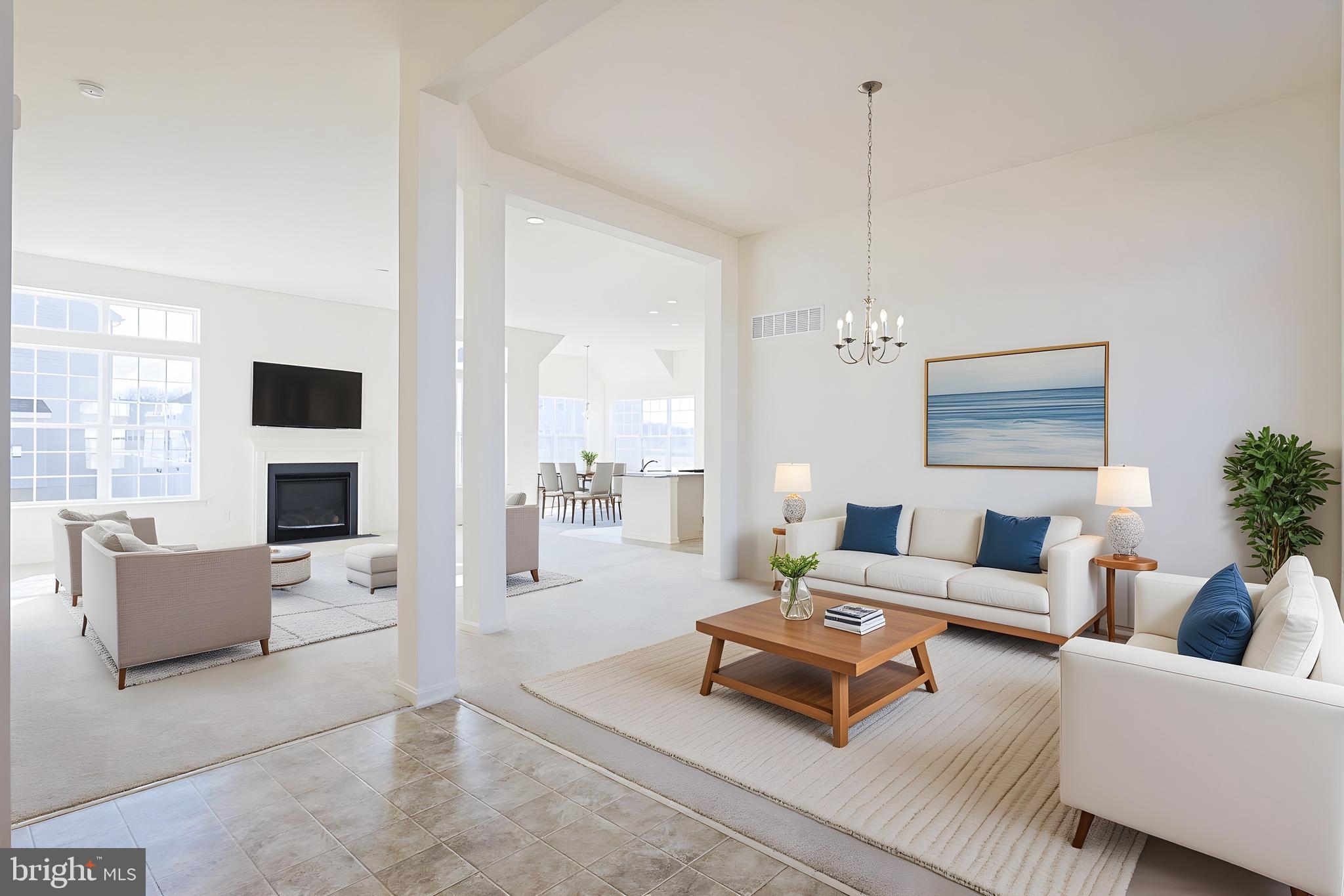 910 Weatherstone Lane Felton, DE 19943 - Photo 3 of 29 a living room with furniture and a flat screen tv