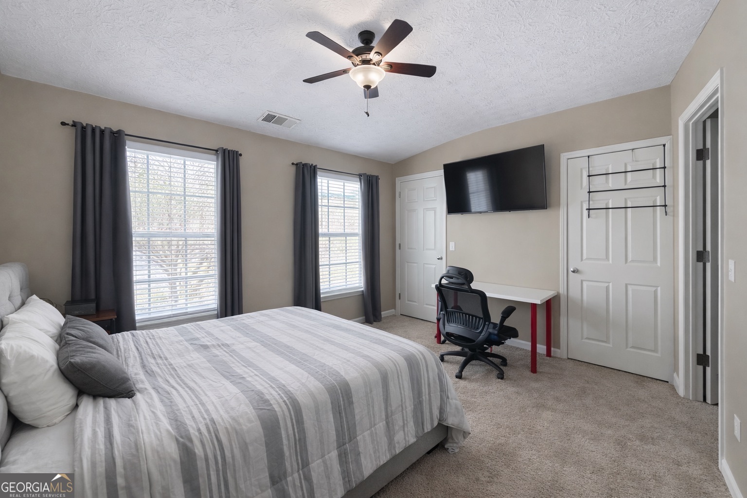 6198 Shoals Loop Union City, GA 30291 - Photo 15 of 21 a bedroom with a bed and a window