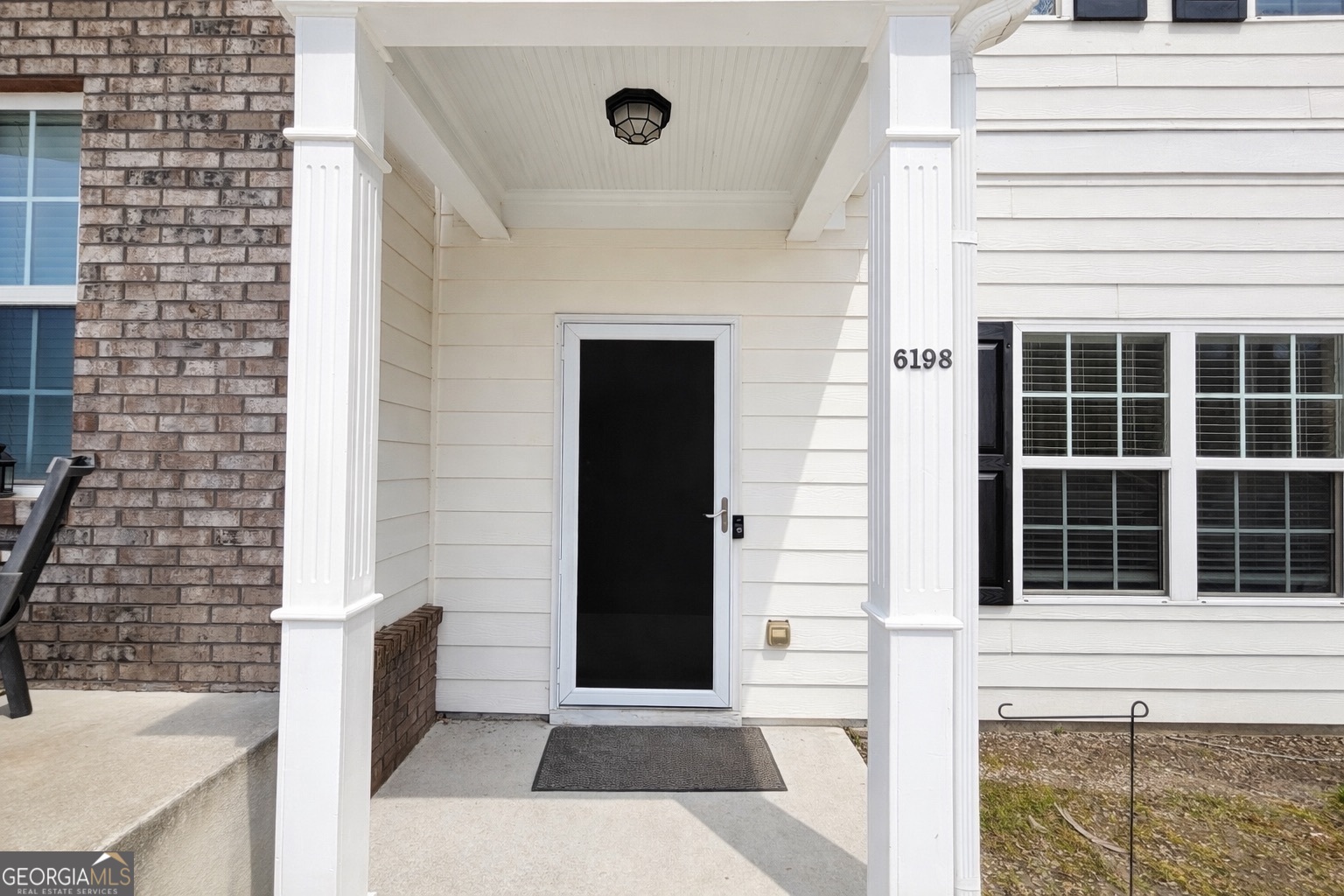 6198 Shoals Loop Union City, GA 30291 - Photo 2 of 21 a view of entry way with wooden door