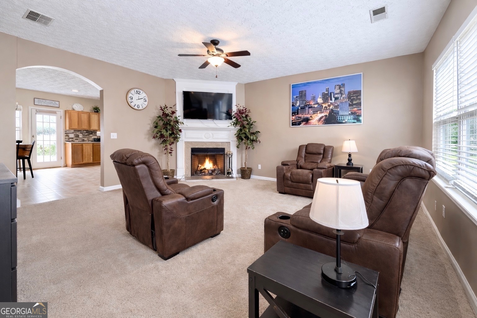 6198 Shoals Loop Union City, GA 30291 - Photo 4 of 21 a living room with furniture and a fireplace