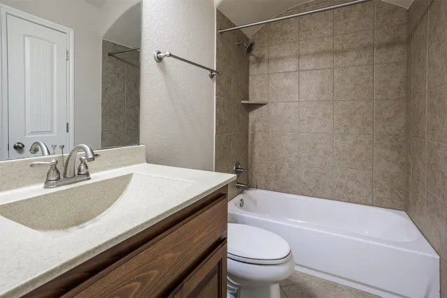 a bathroom with a sink and a bathtub
