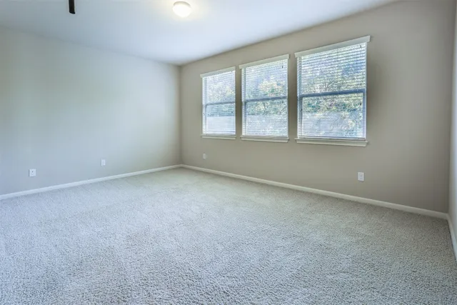 an empty room with windows