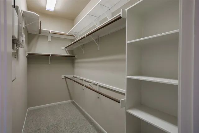 a view of an empty walk in closet