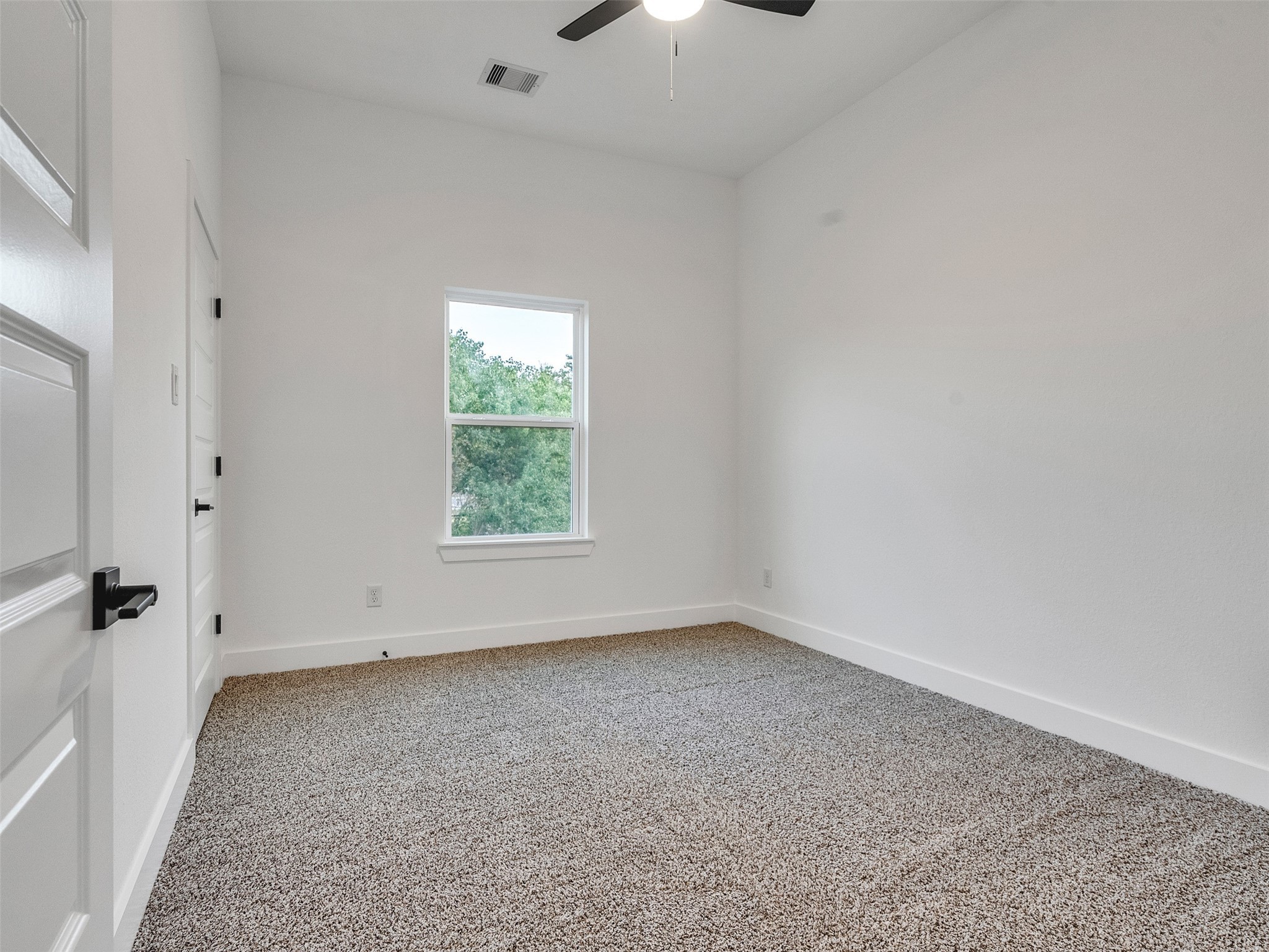 7358 Guadalcanal Road, Unit A Houston, TX 77033 - Photo 24 of 35 an empty room with a window