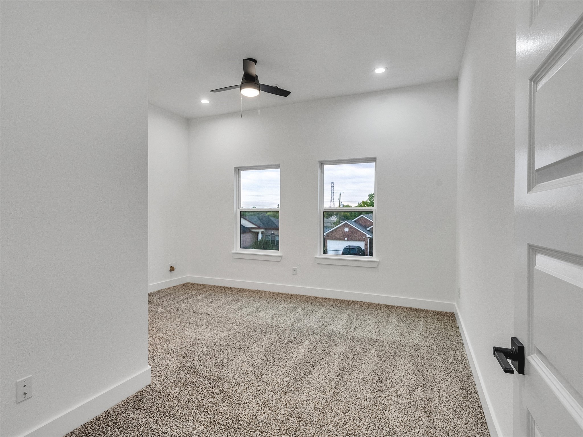 7358 Guadalcanal Road, Unit A Houston, TX 77033 - Photo 27 of 35 wooden floor in an empty room with a window