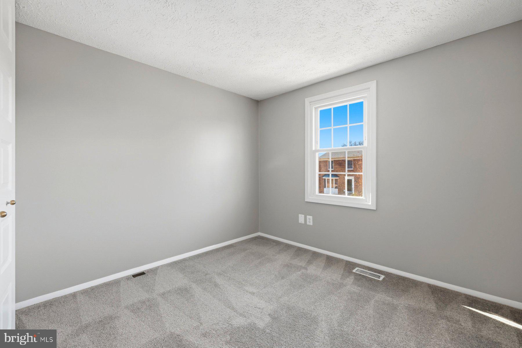 5 Pontiac Way Gaithersburg, MD 20878 - Photo 25 of 40 a view of an empty room with a window