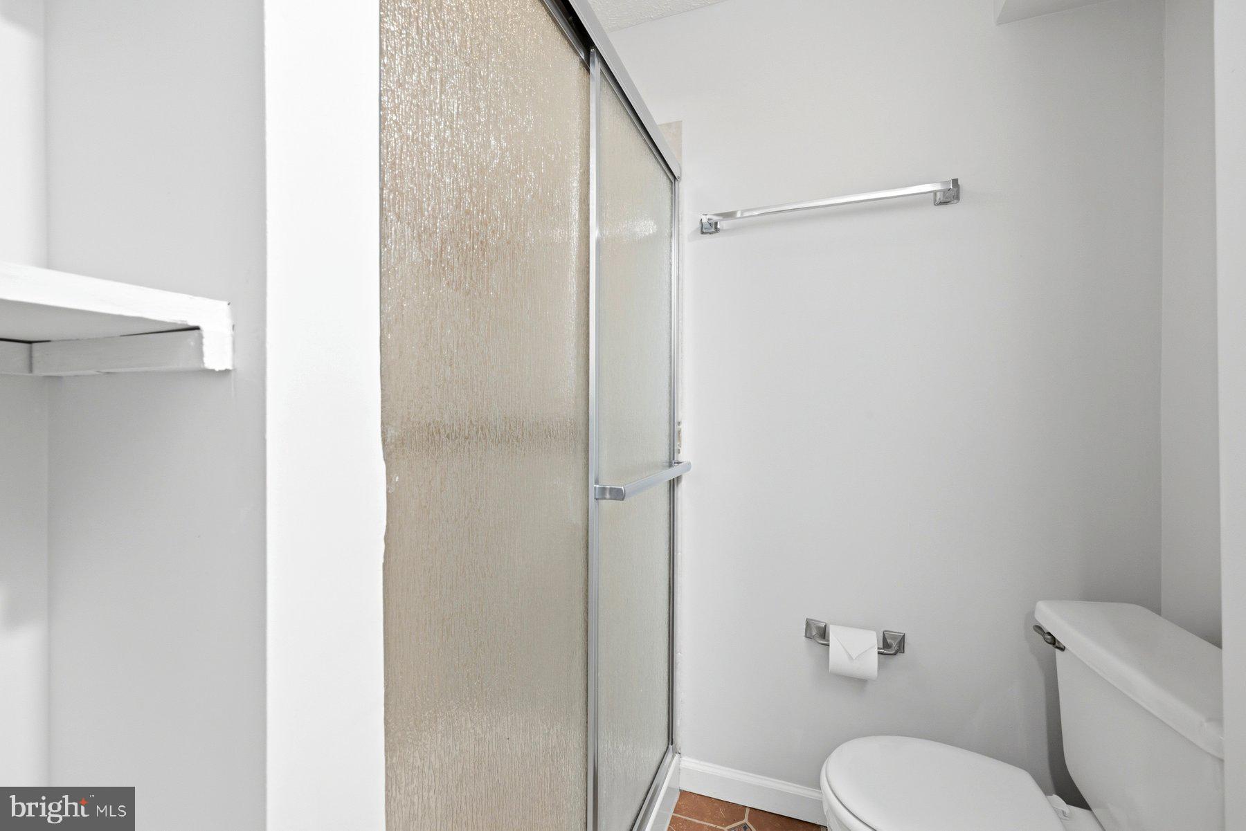 5 Pontiac Way Gaithersburg, MD 20878 - Photo 31 of 40 a white toilet sitting next to a bathroom sink