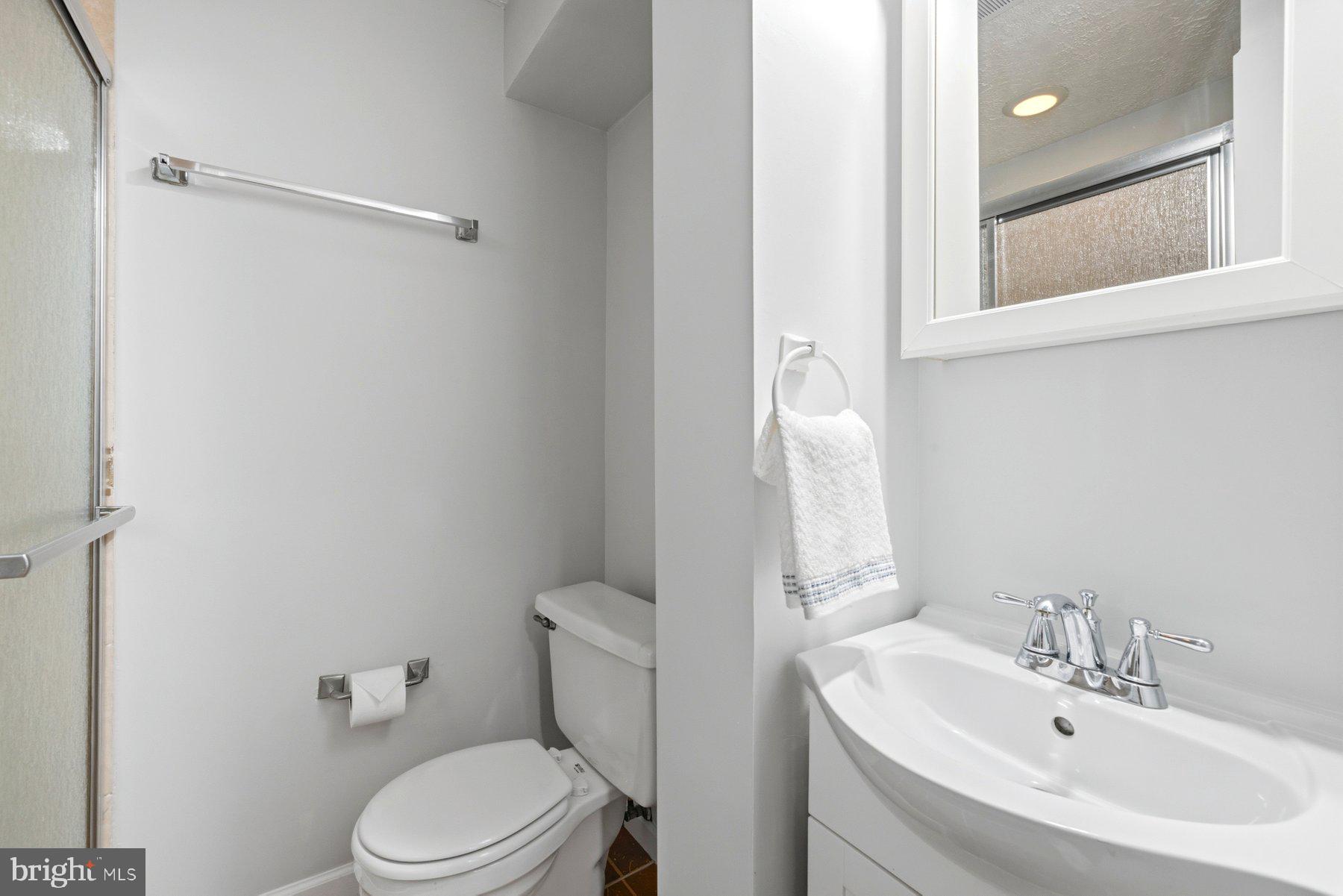 5 Pontiac Way Gaithersburg, MD 20878 - Photo 32 of 40 a bathroom with a sink toilet and shower