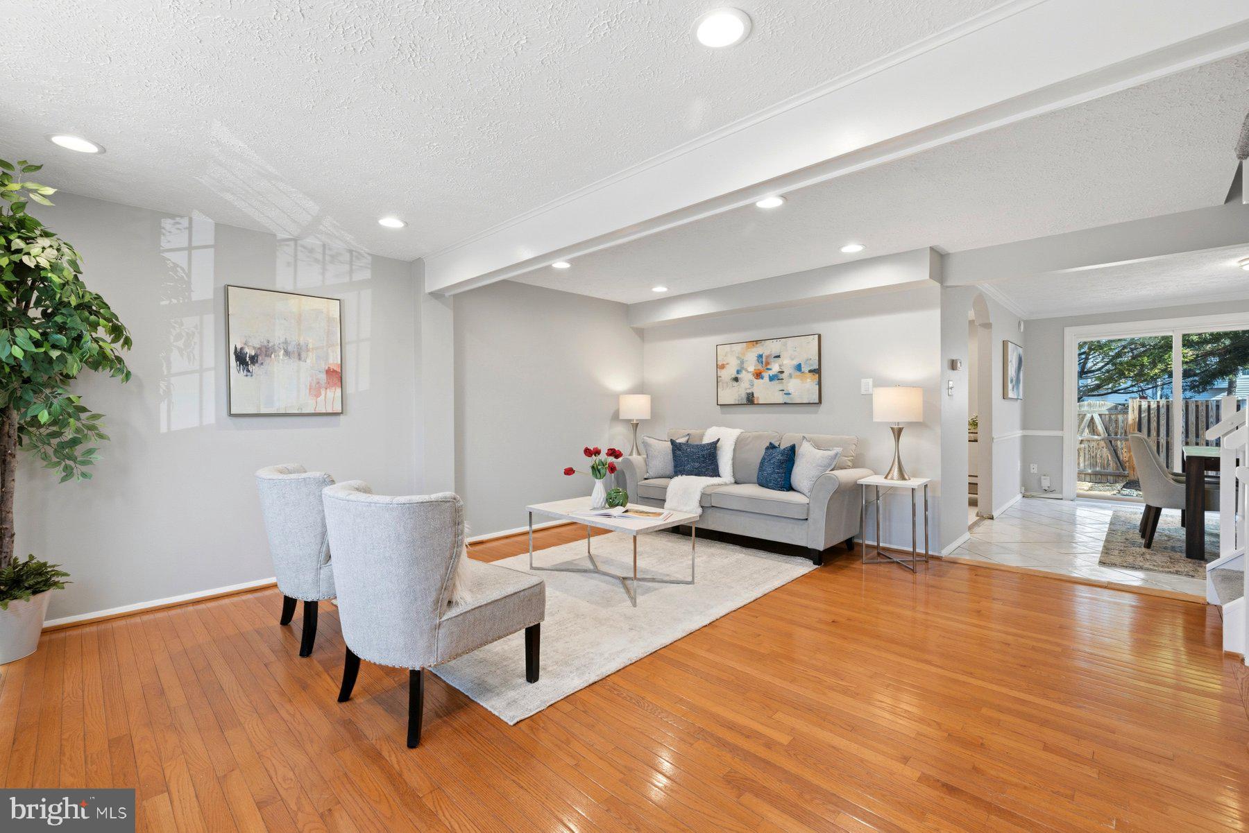 5 Pontiac Way Gaithersburg, MD 20878 - Photo 4 of 40 a living room with furniture and wooden floor
